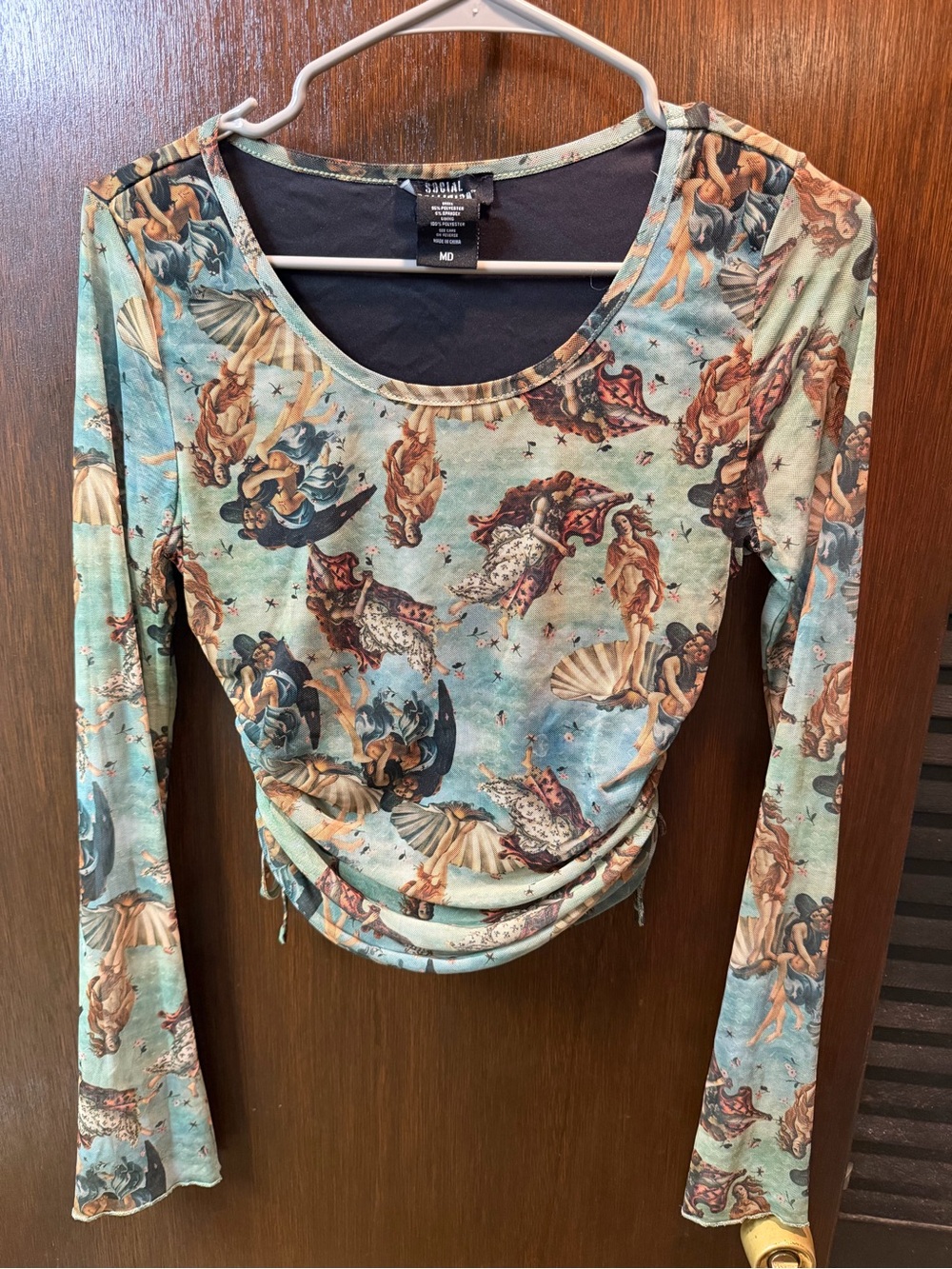 Social collision long sleeve bell sleeve angel mesh side scrunch top size med